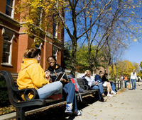 Students on benches at the University of Iowa